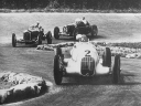 [thumbnail of 1934 italian gp - rudolf caracciola (mercedes-benz w25), achille varzi (alfa romeo p3), tazio nuvolari (maserati 6c-34).jpg]